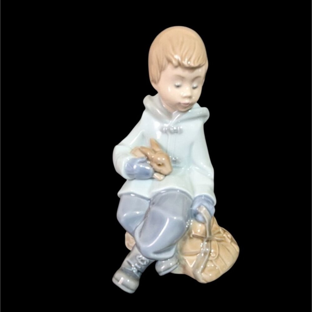 NAO‎ by Lladro 1987 Figurine Boy Sitting on Bag Holding Bunny Rabbit Vintage